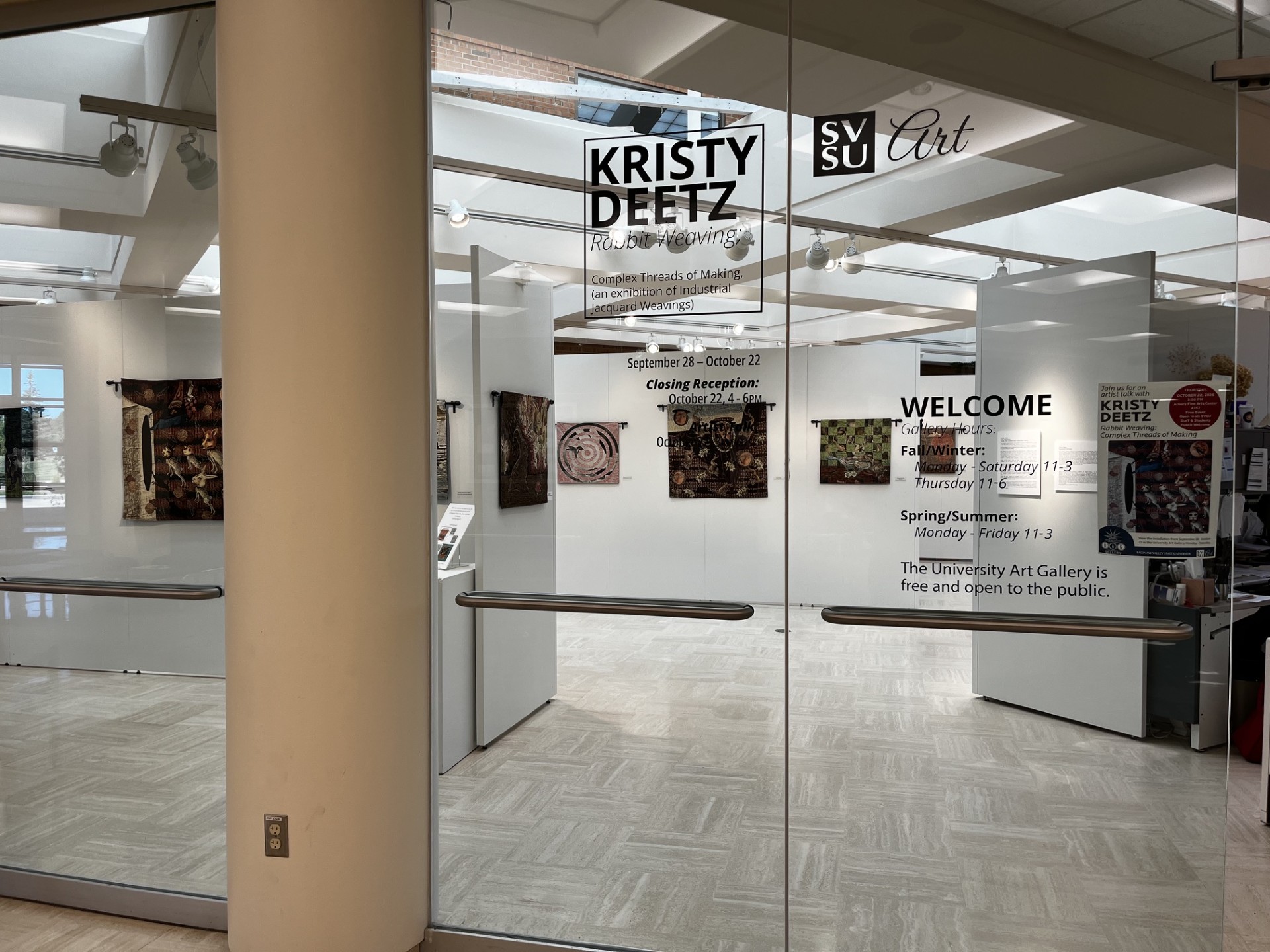 Entrance to Deetz gallery exhibition with window clings